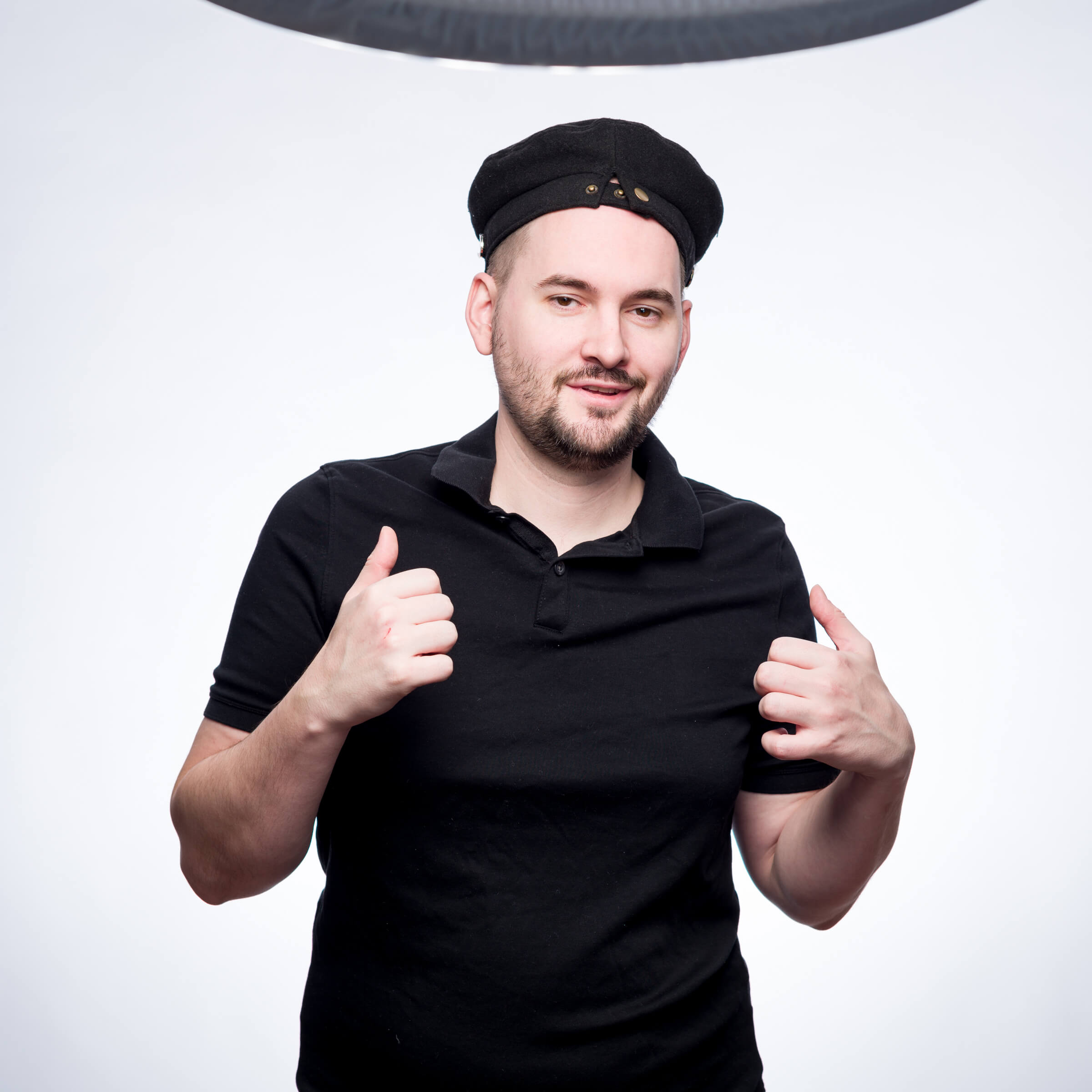 Prohibited Keywords 1 A man in a black hat giving a thumbs up on Amazon.