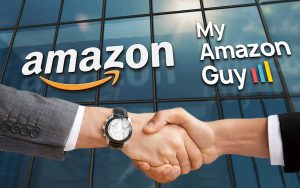 Two men shaking hands in front of an amazon sign, representing a successful collaboration in account management with My Amazon Guy.